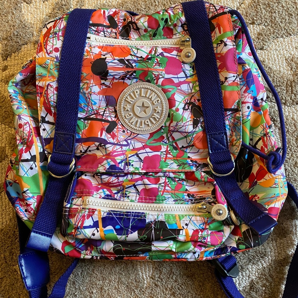 Kipling paint splatter backpack